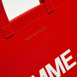 Comme des Garçons Sacs|Grand sac fourre-tout en Cuir avec logo rouge - 33x36x0.5 cm