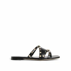 Valentino Garavani Sandales Plates|Sandales plates en cuir Rockstud noires